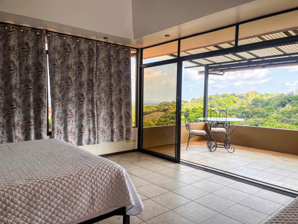 
This bedroom offers a private balcony with stunning views, providing the perfect backdrop to wake up to every morning of your Costa Rican adventure.