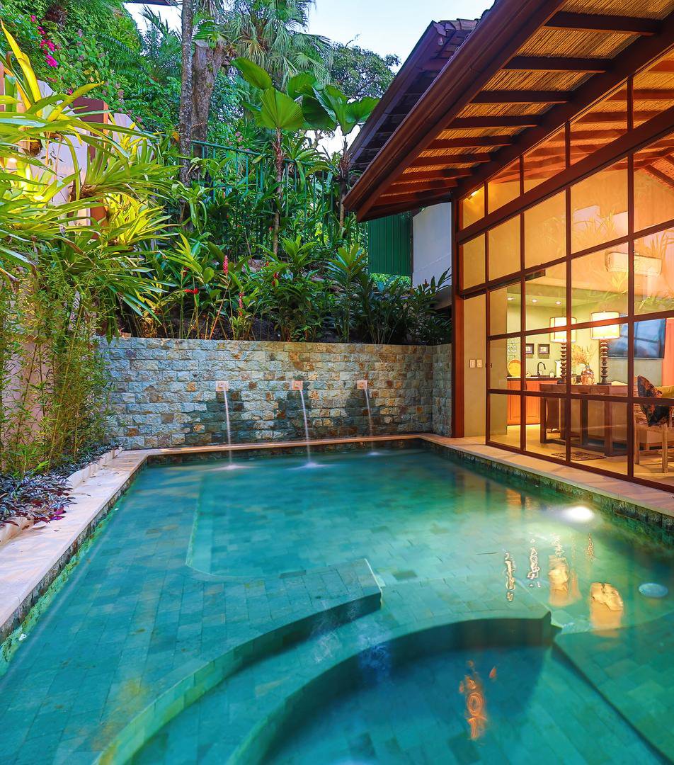 Additional private pool surrounded by bamboo and tropical greenery in a Manuel Antonio villa.