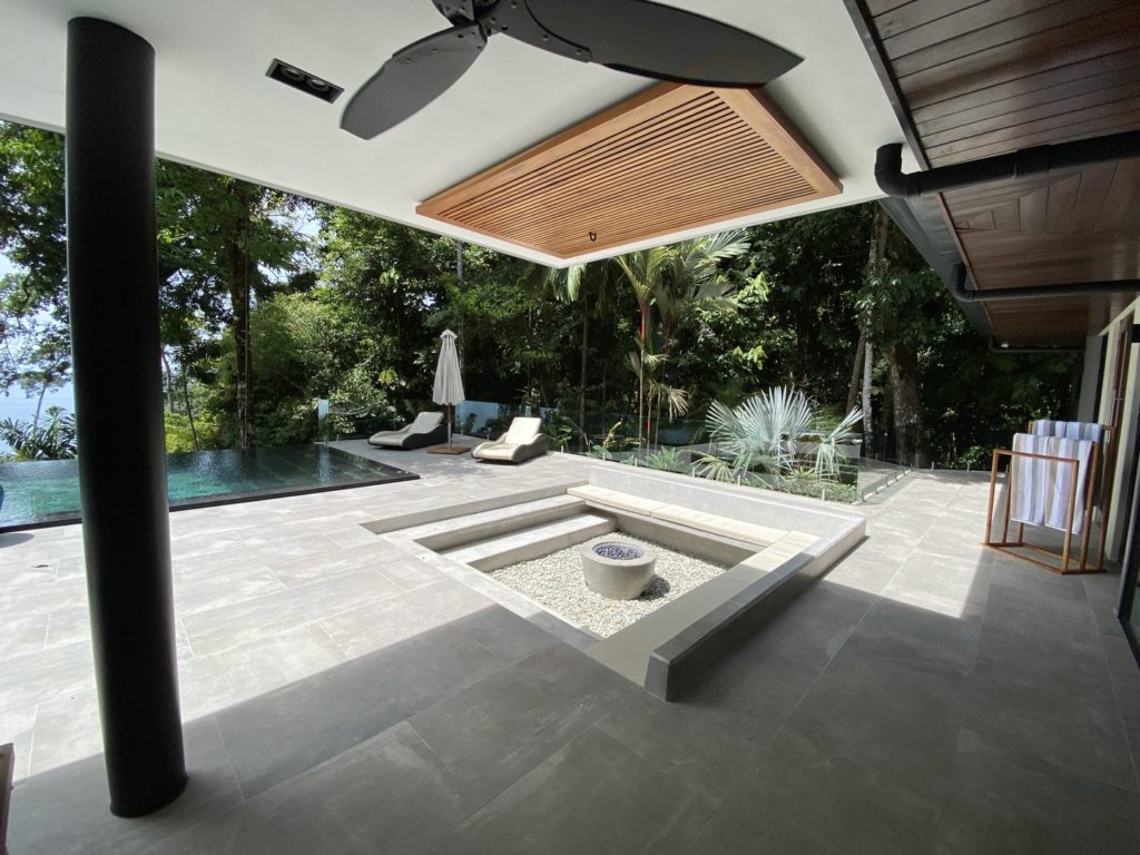 Right next to the refreshing infinity pool is this plush fire pit, a fantastic spot to hang out.