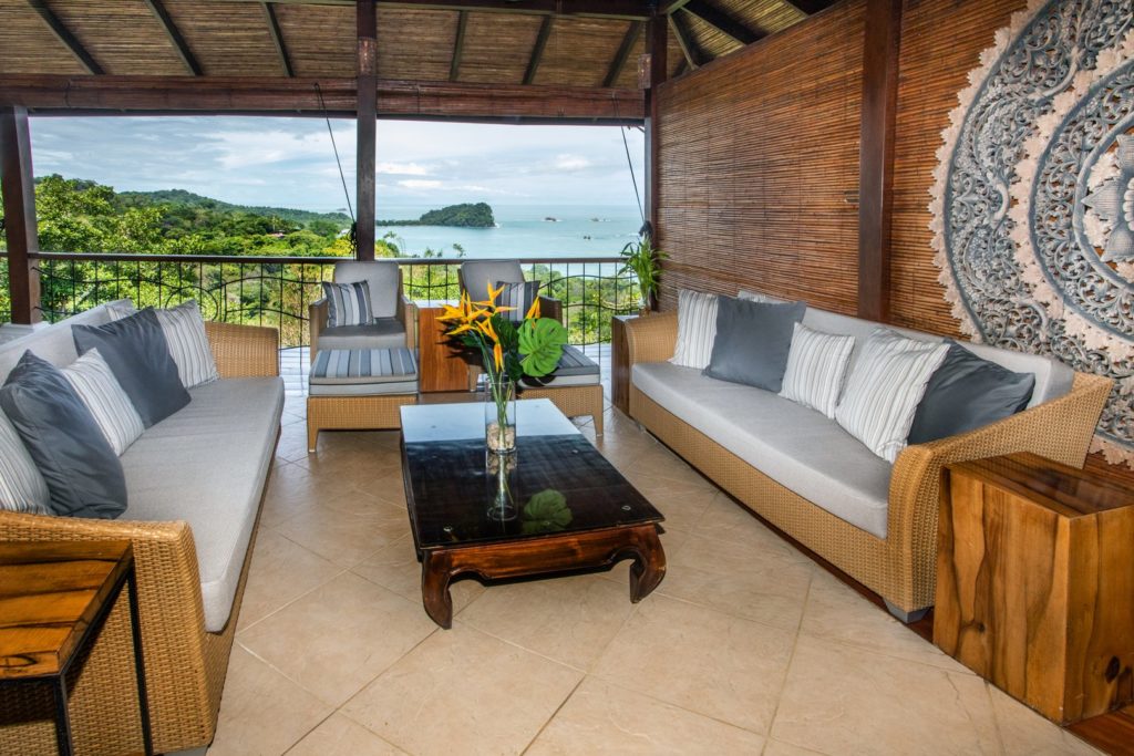 The natural materials and stunning views provide a relaxing vibe in this open-air sitting area.