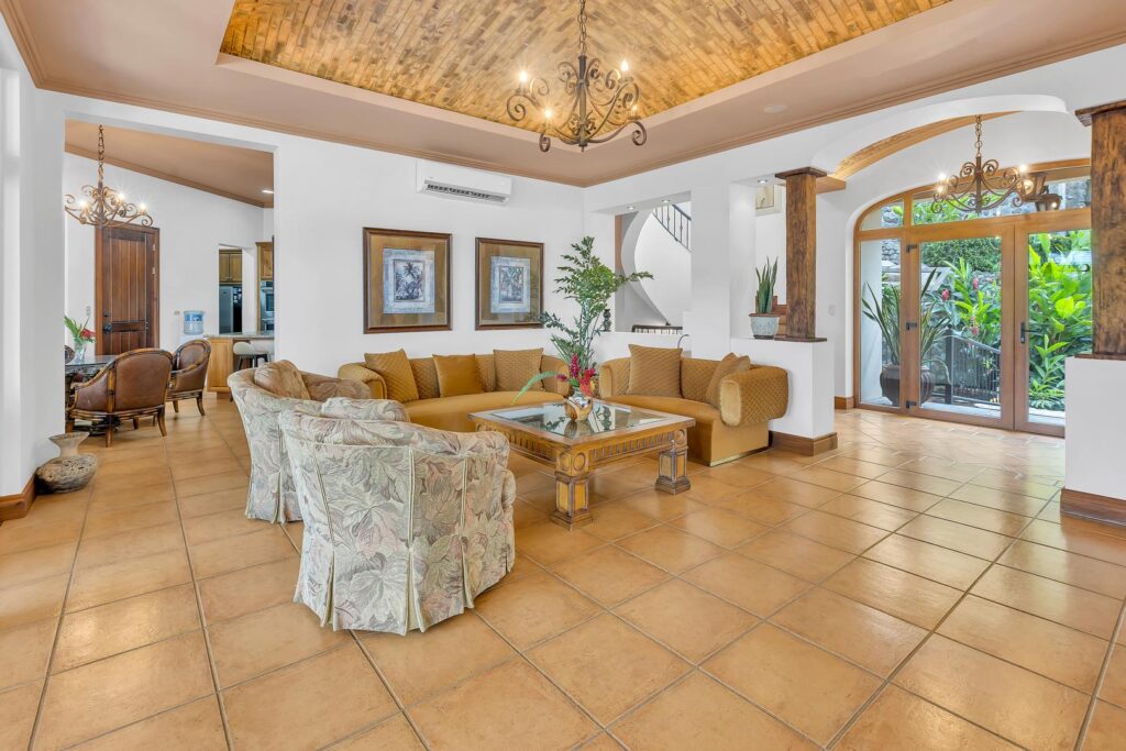 Designed for comfort, easy conversation, and smooth access to the garden and pool areas.