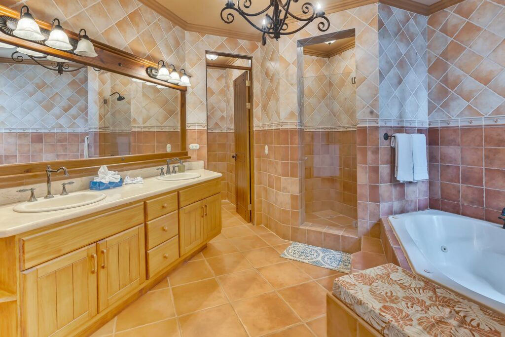 Spacious features and a spa-style tub create a comfortable retreat for unwinding.