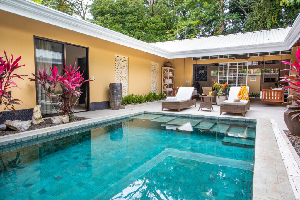 The natural details around the property and pool help to create a relaxing ambience.