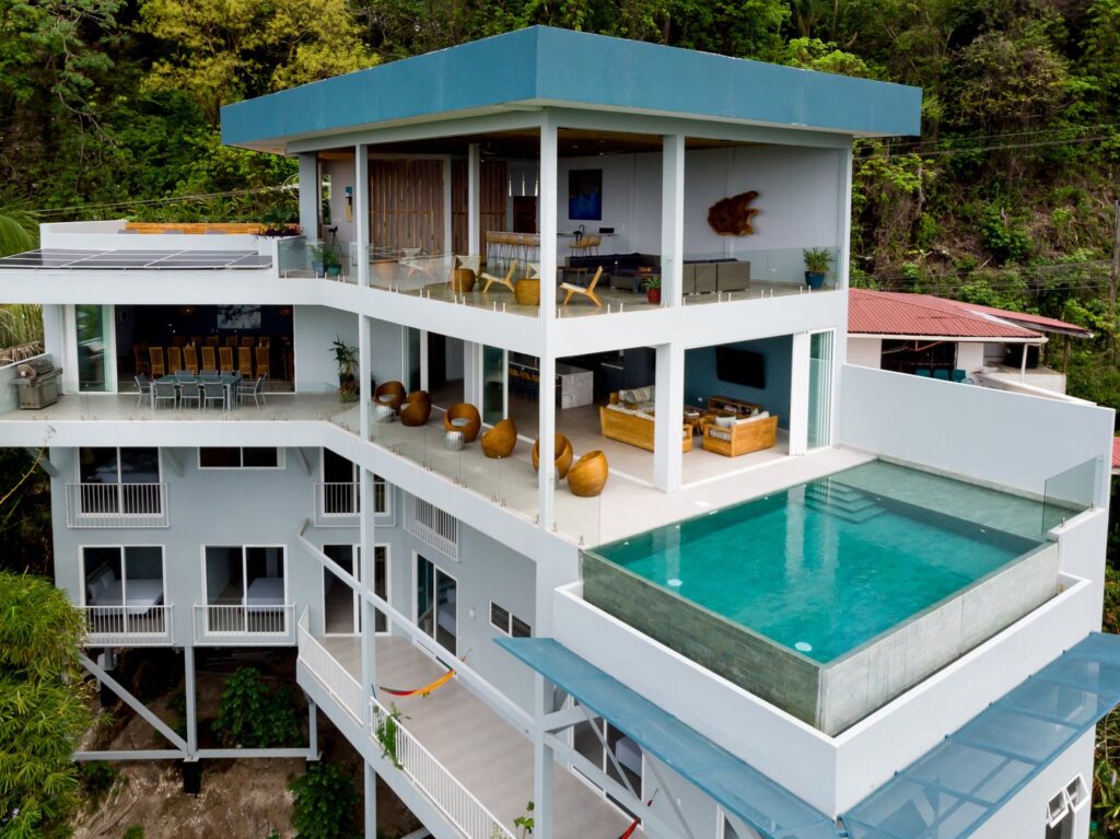 This incredible vacation villa in the heart of Manuel Antonio has nine bedrooms and can sleep up to twenty-eight guests.