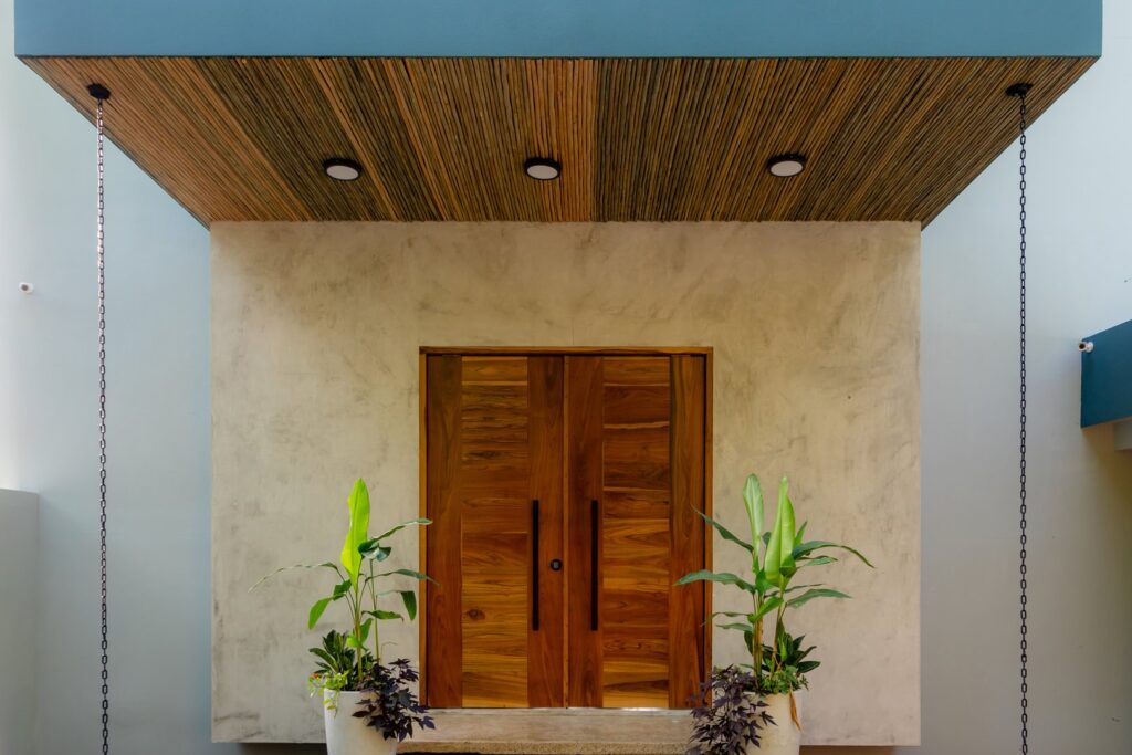 The stunning entrance to the villa is beautifully designed using natural materials.