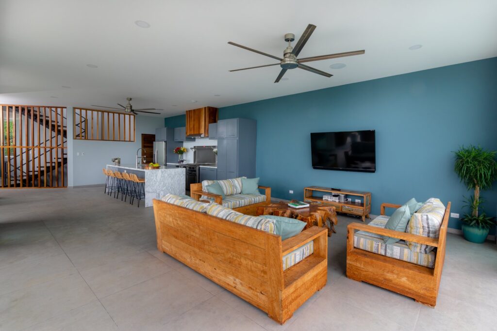 This luxury seating area is a great space to unwind with family after a fun day at the beach.
