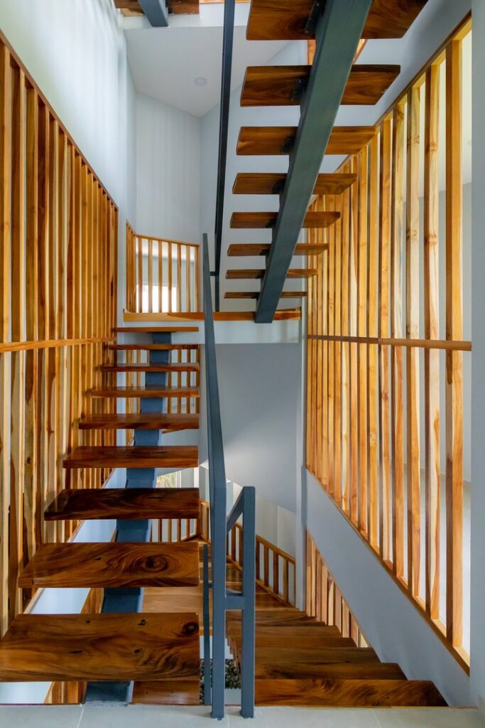 Stunning native wood features in this artistic handcrafted staircase.
