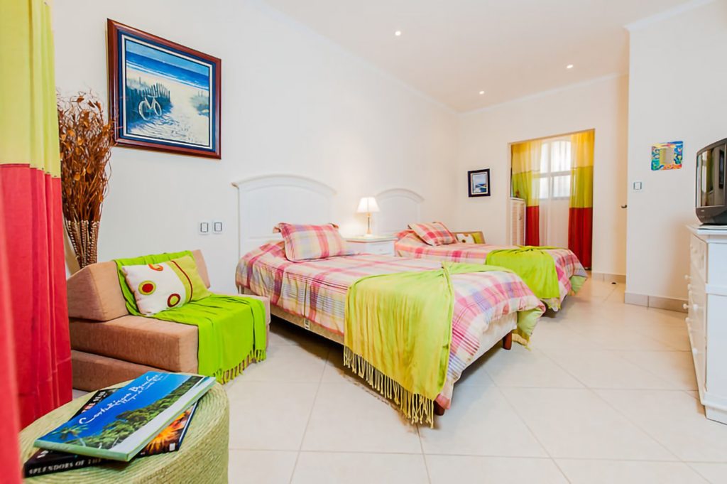 This colorful bedroom is popular with younger guests.