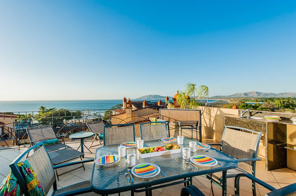 The crystal clear ocean and blue cloudless Tamarindo sky is the backdrop to family meals on the terrace.
