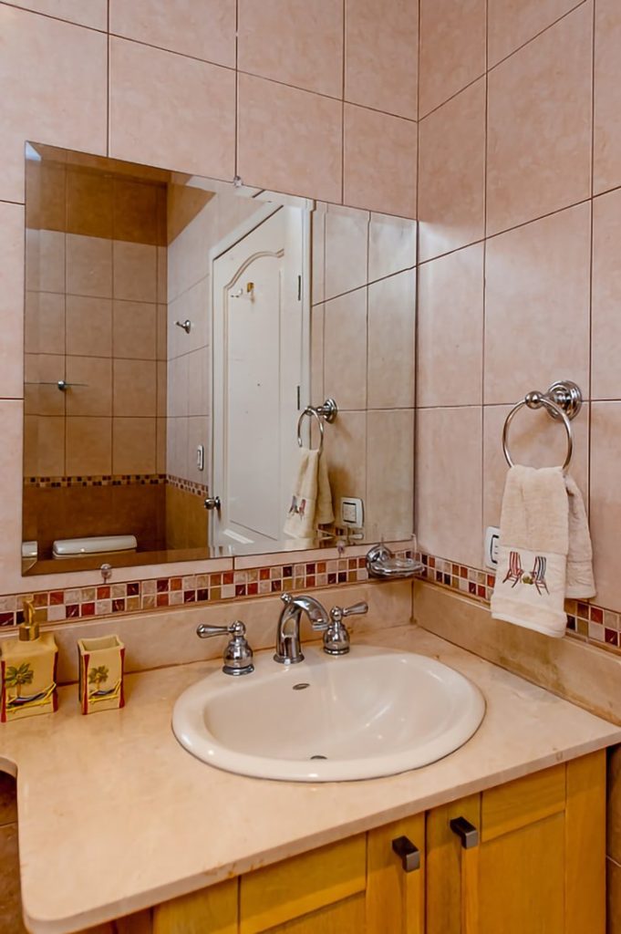 The spacious bathrooms have modern fixtures.