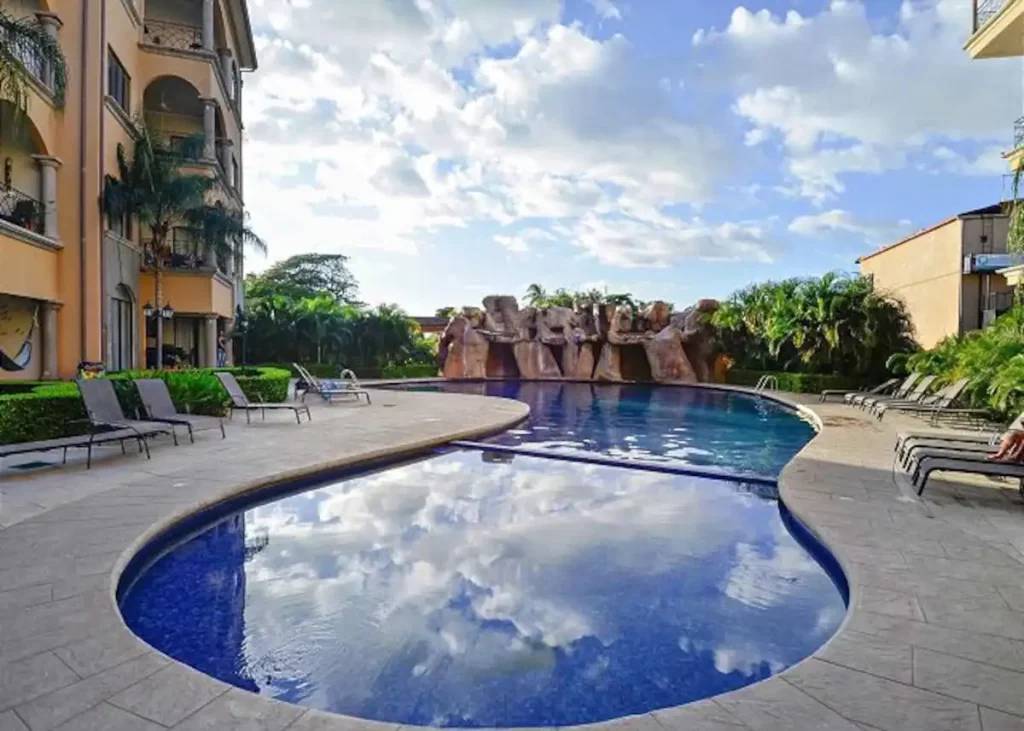 The huge pool features a separated wading area for younger guests at one end.