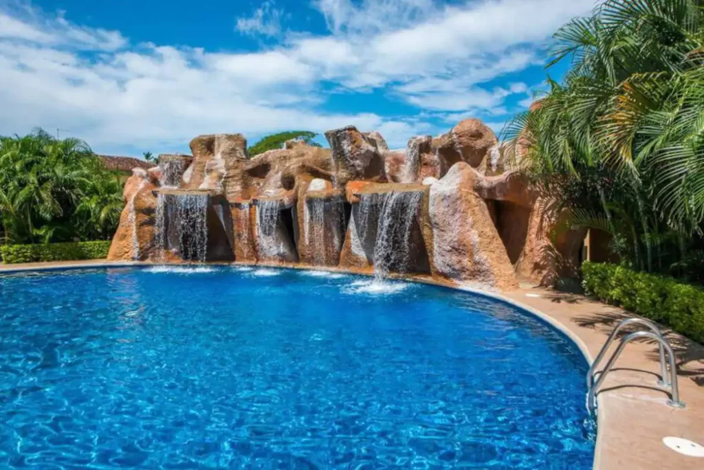 Who would not want a magnificent waterfall in the pool? Awesome!