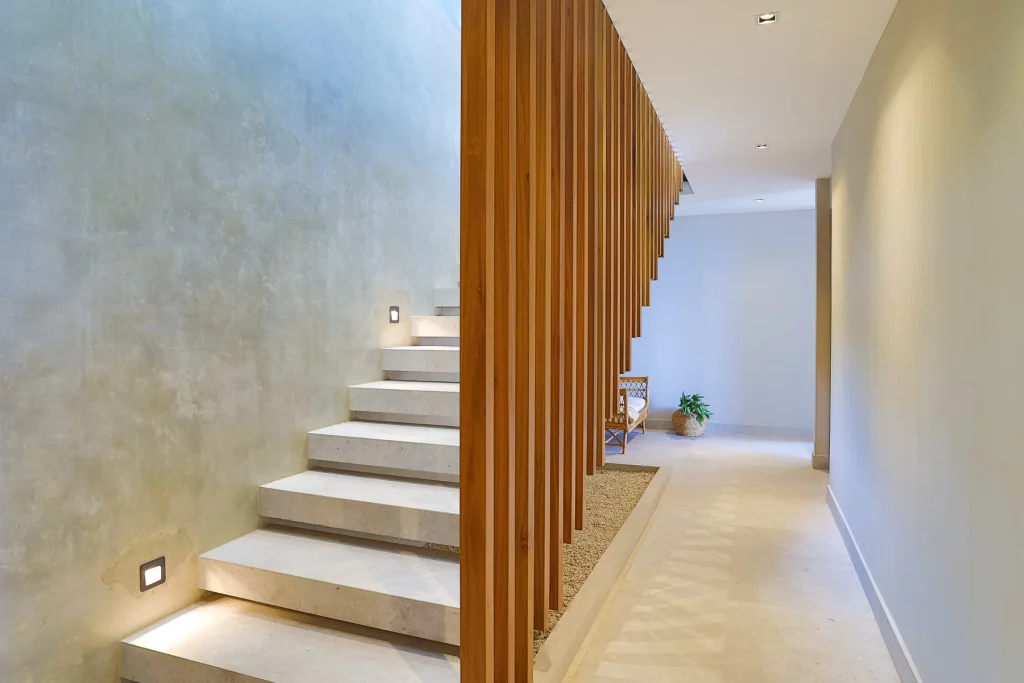 The design of this wood and stone staircase is amazing.
