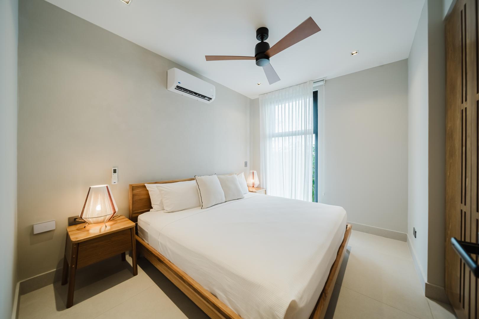 Minimalist bedroom with modern design and natural light in Manuel Antonio Costa Rica