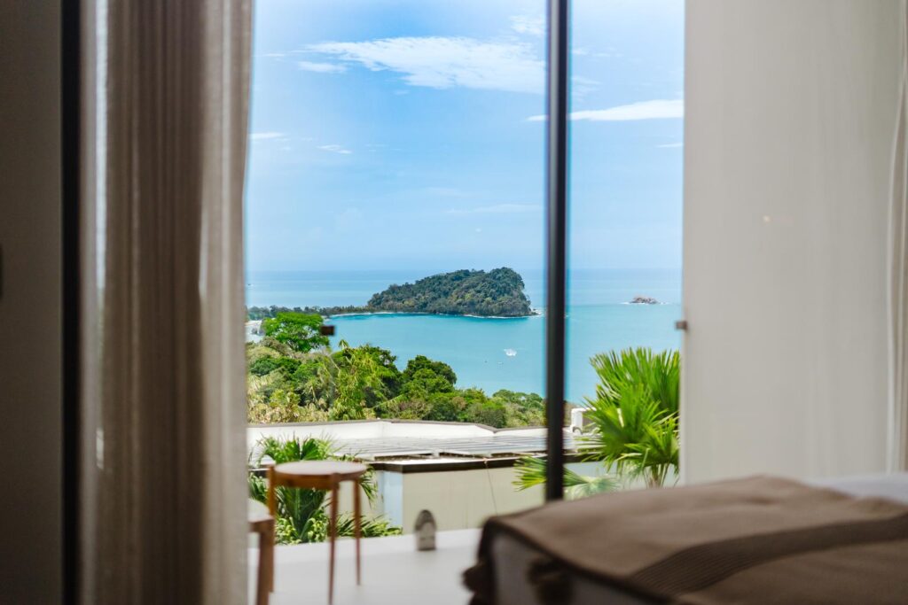 Just beyond the room, Cathedral Point and the Pacific come quietly into view.