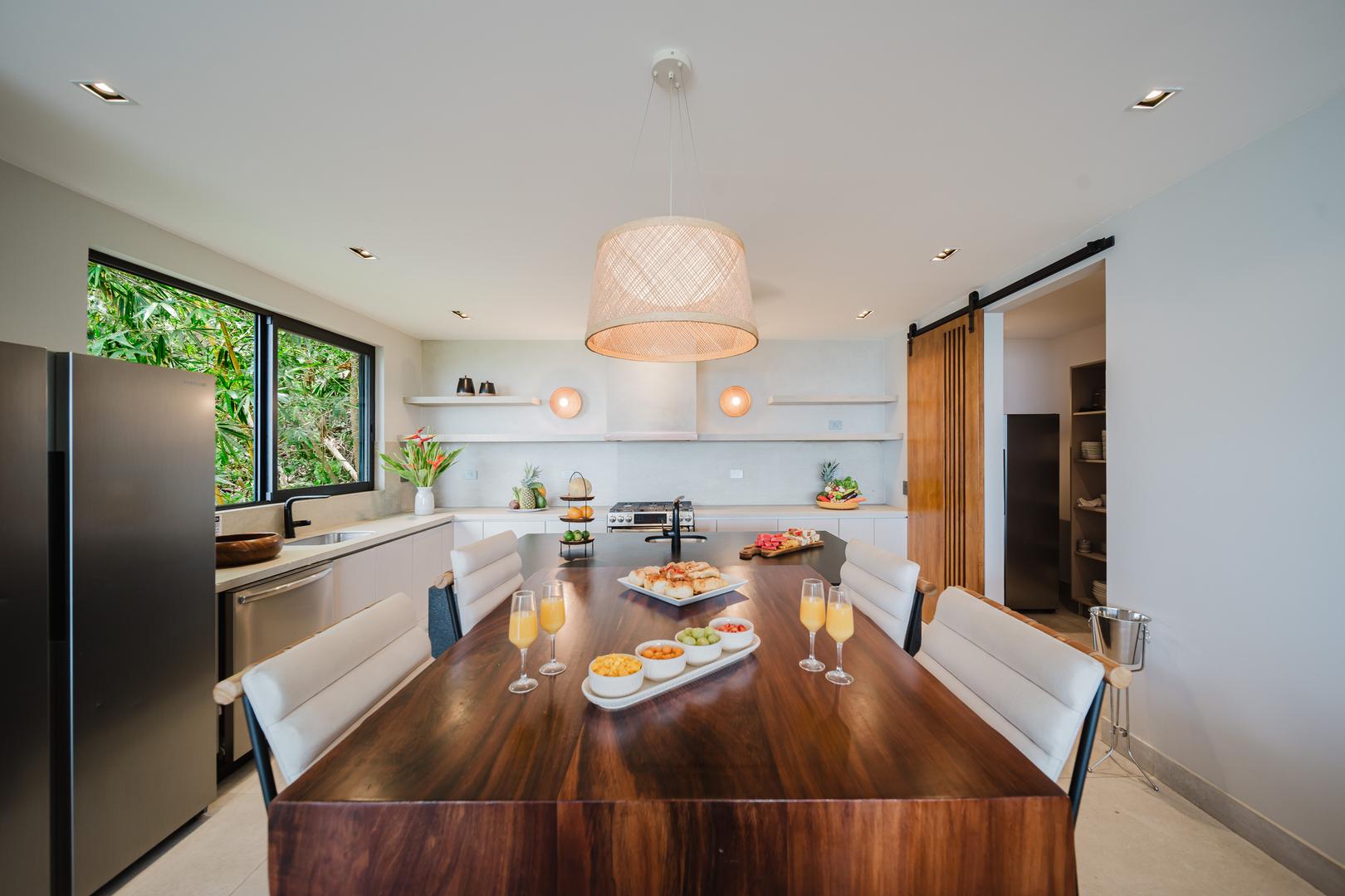 Kitchen island with seating in modern open plan villa Manuel Antonio Costa Rica