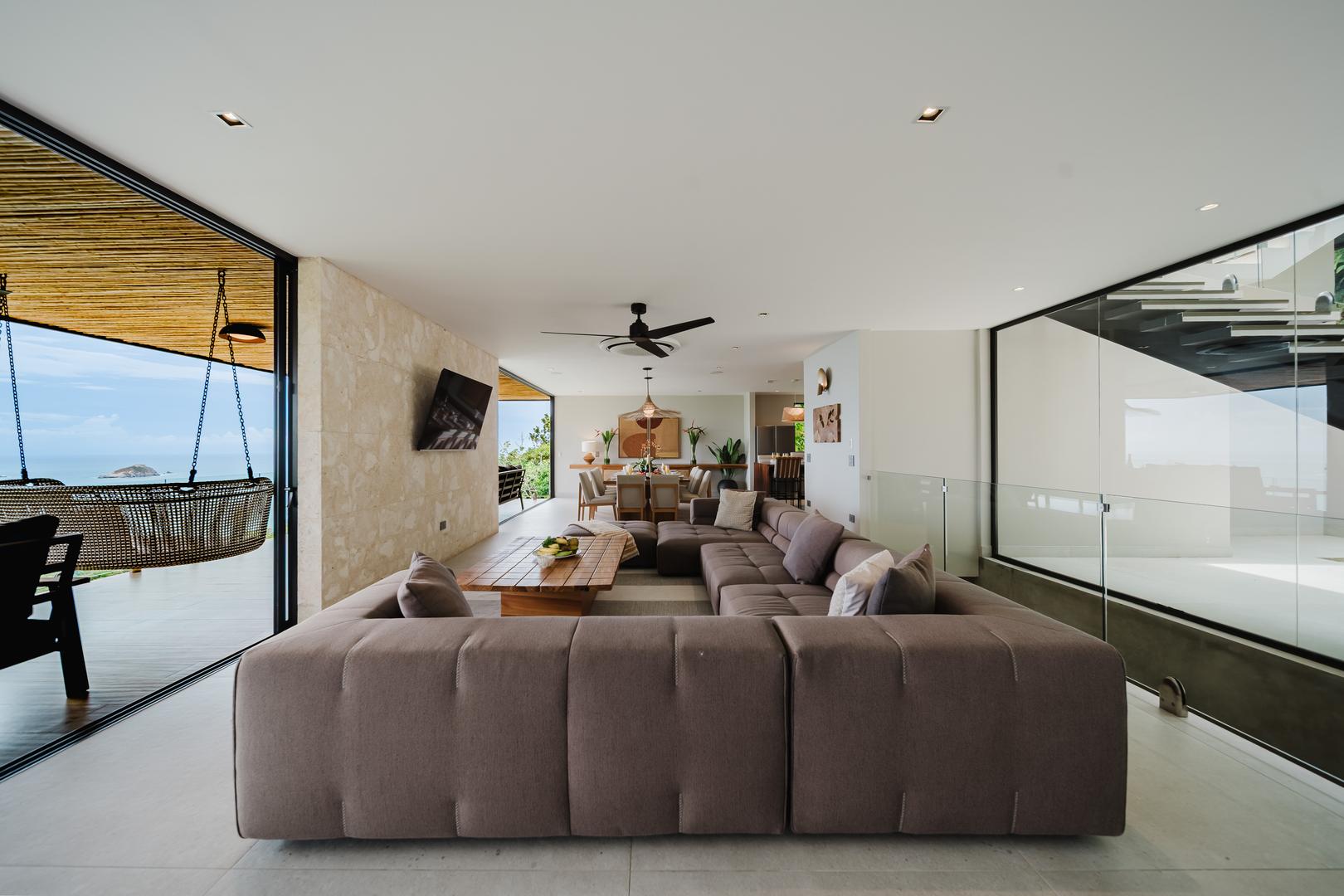 Open concept living room with access to ocean view terrace Manuel Antonio Costa Rica