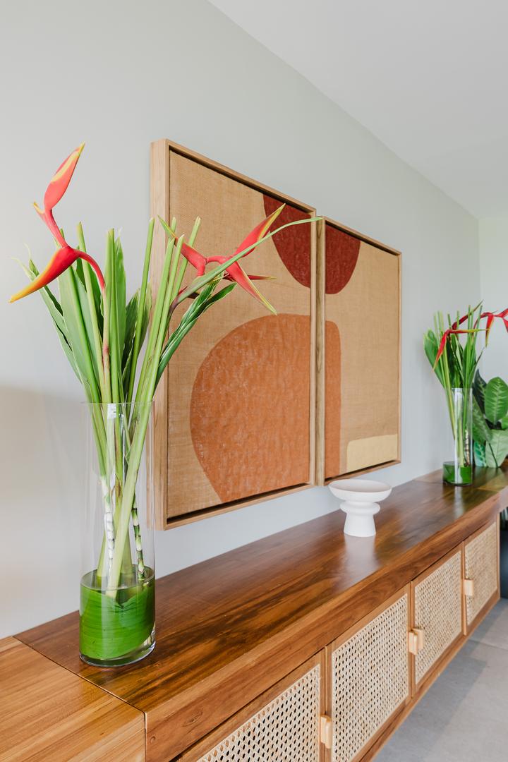 Interior design detail with wooden console table artwork and decor Manuel Antonio Costa Rica