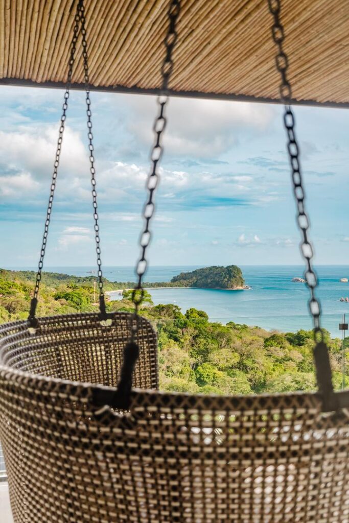 A suspended seat at the edge of the view, where the Pacific stretches without end.