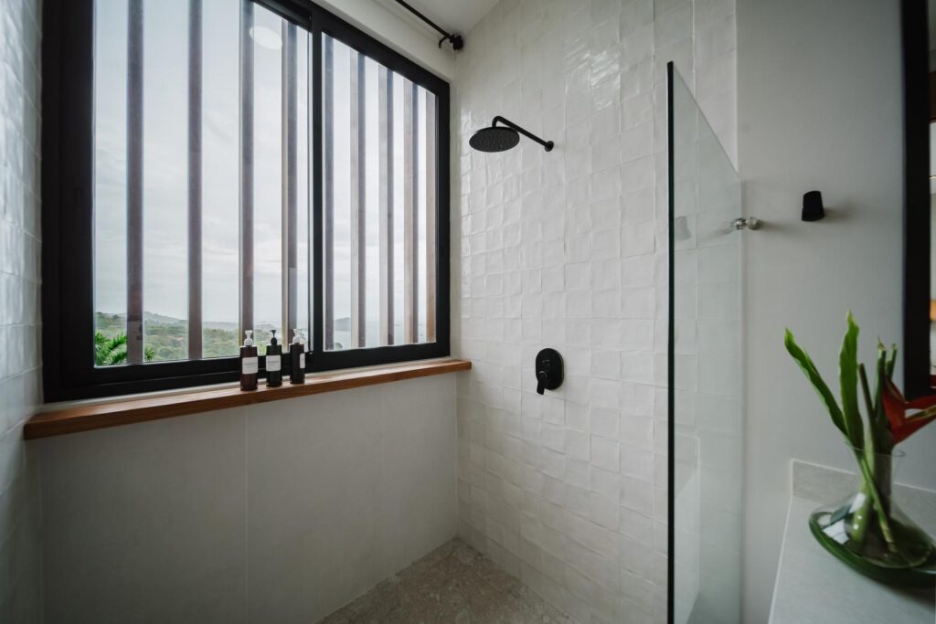 Soft natural light filters in, extending the space beyond its walls.