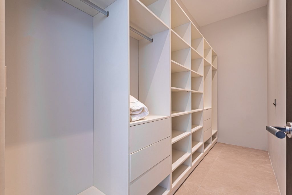 Plenty of storage space in this luxurious walk-in closet.