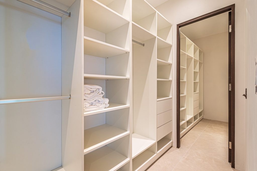 The giant walk-in closets have ample storage space, ideal for large families.
