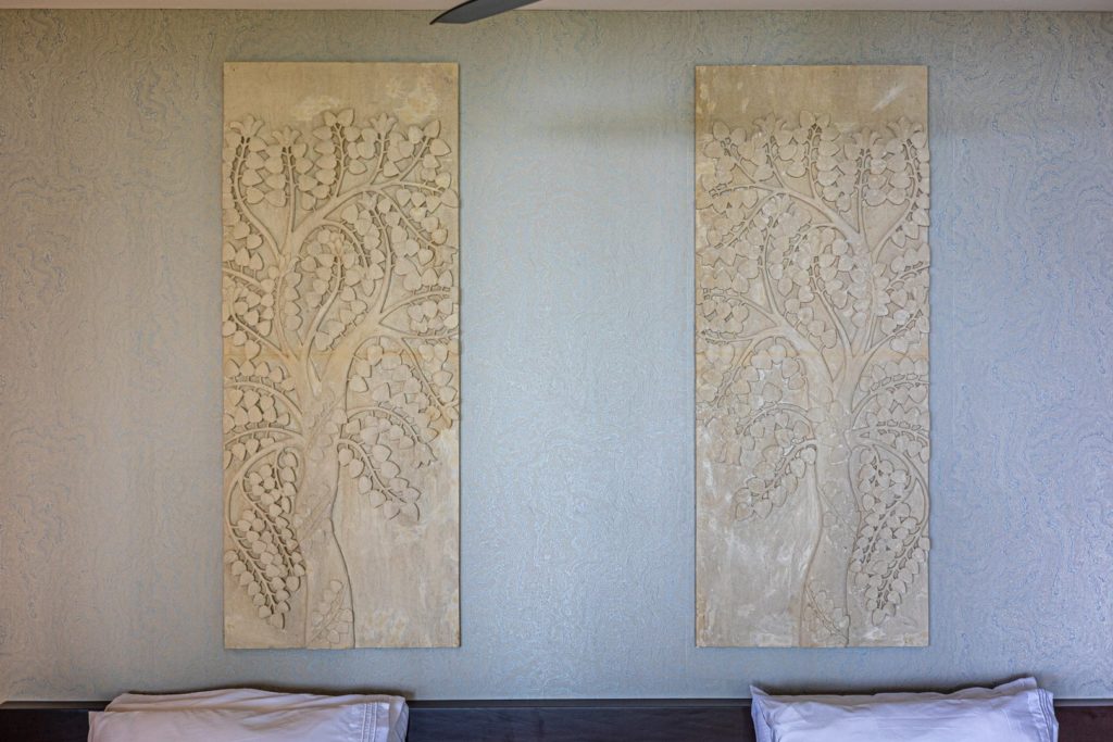 Handcrafted decorative elements add an organic feel to this luxury vacation villa.