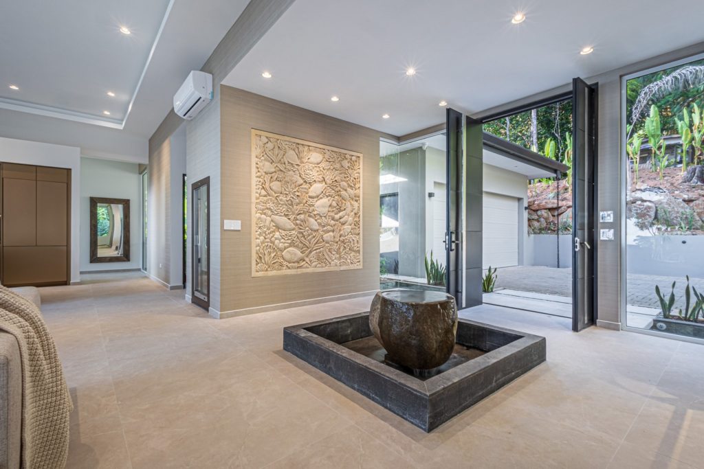 The incredible entrance to this stunning villa sets the scene for the beautiful modern design throughout.