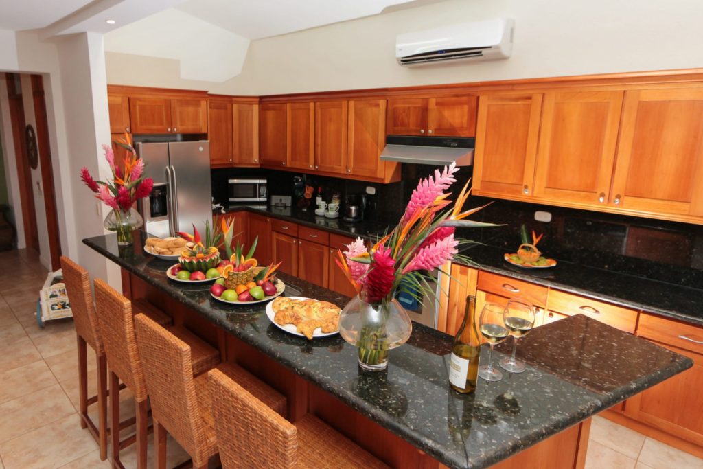 The modern gourmet kitchen complete with a breakfast bar, it's the perfect spot for everyone to gather and hang out. 