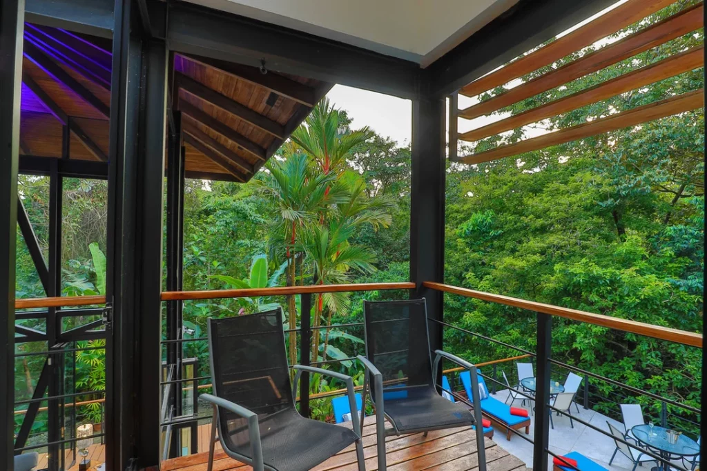 Breathe in the tranquility of the rainforest from your bedroom balcony.