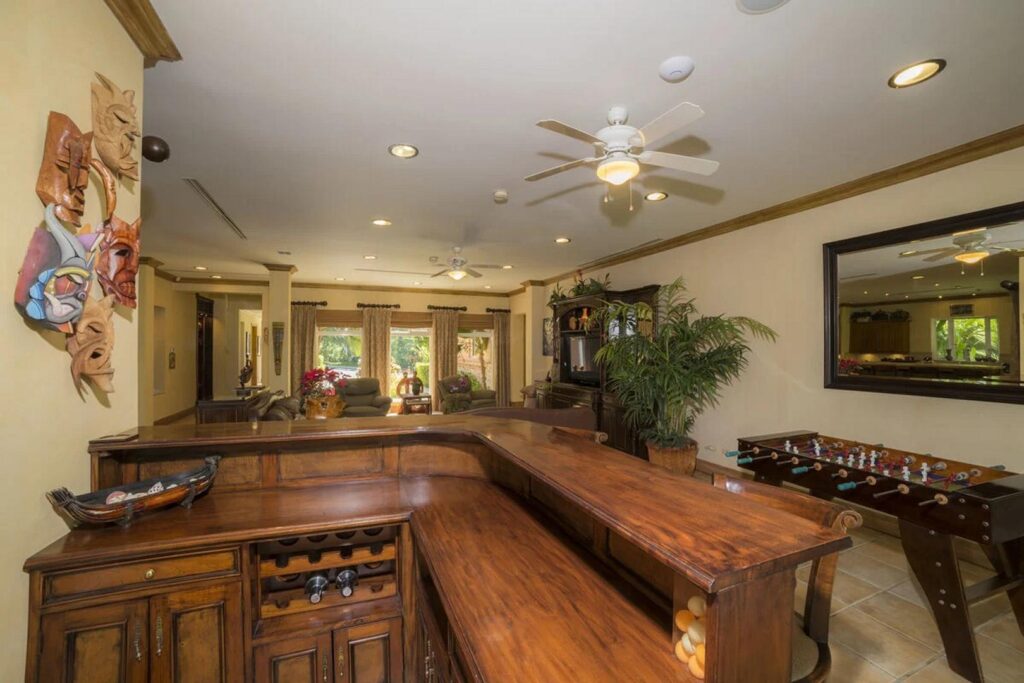 The bar and the game room are a true experience, handcrafted from the finest hardwoods of Costa Rica