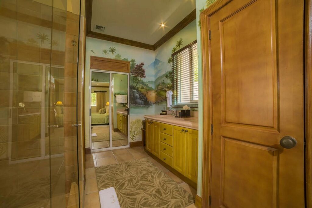 A prime example of a bedroom and bathroom combination that this house will offer to you and your friends