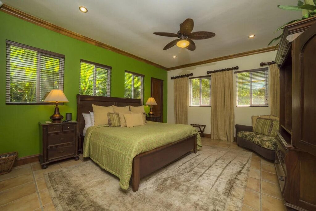 Yet another example of a beautifully designed and spacious bedroom, ready for you or your guests