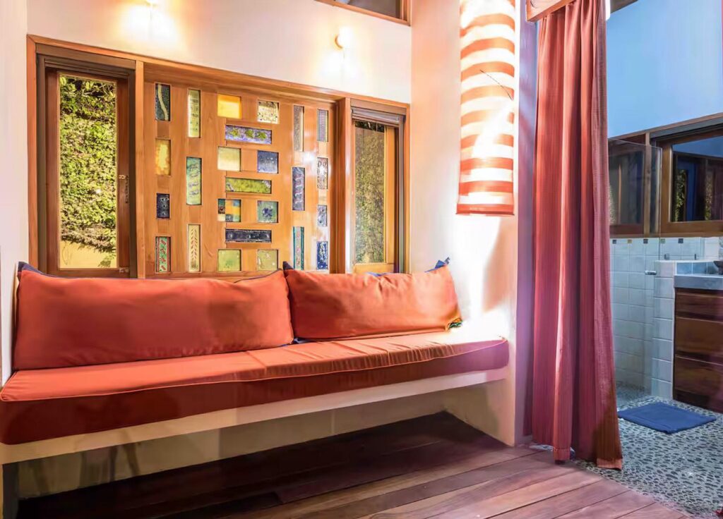 The bedrooms have air conditioning and private bathrooms and here there is a comfy sitting area.