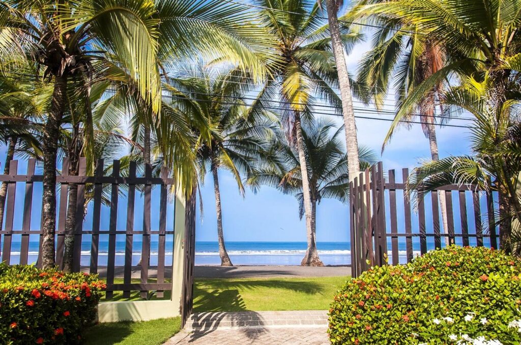Step out of your gate, through the swaying palms and you are on the golden sand of Jaco Beach... no need for shoes!