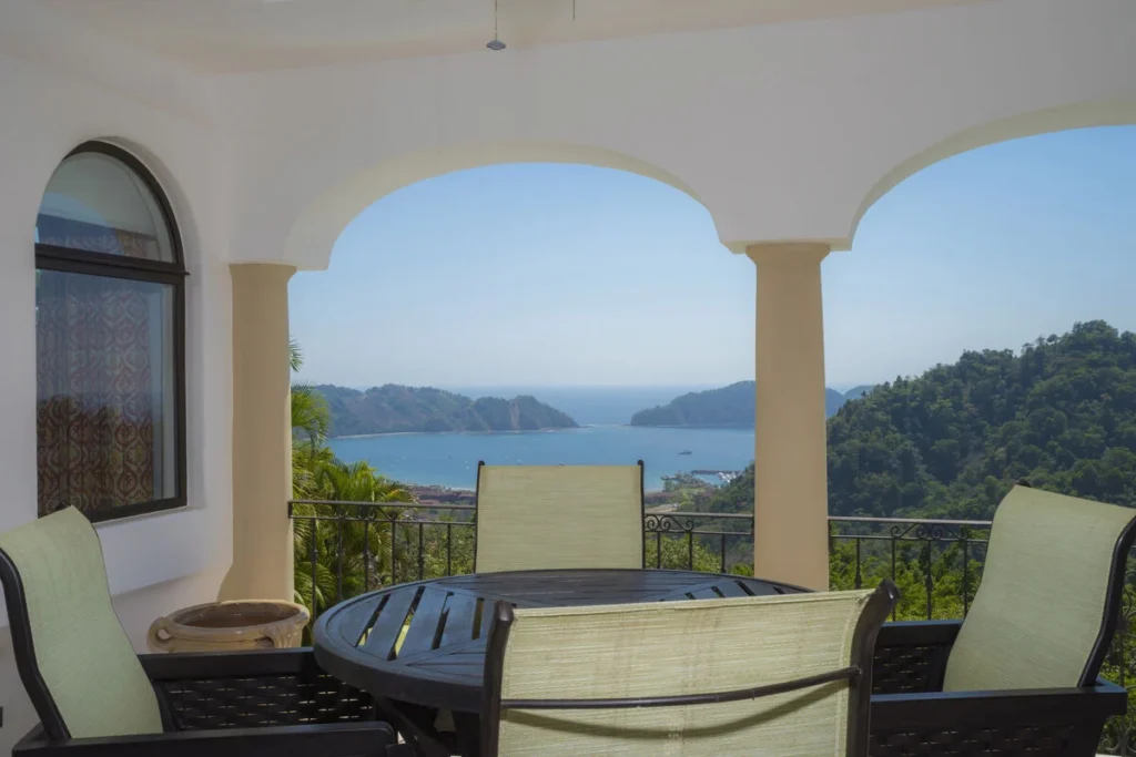 Savor your morning coffee on this tranquil balcony with inspiring views.