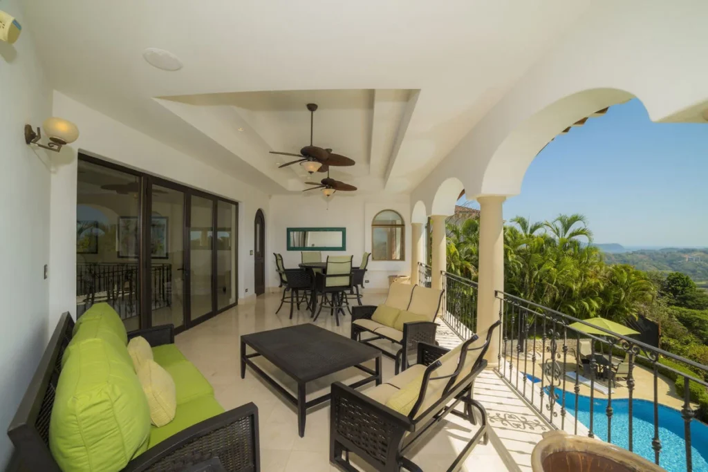 The balcony is an ideal spot for drinks and conversation while enjoying incredible scenery.