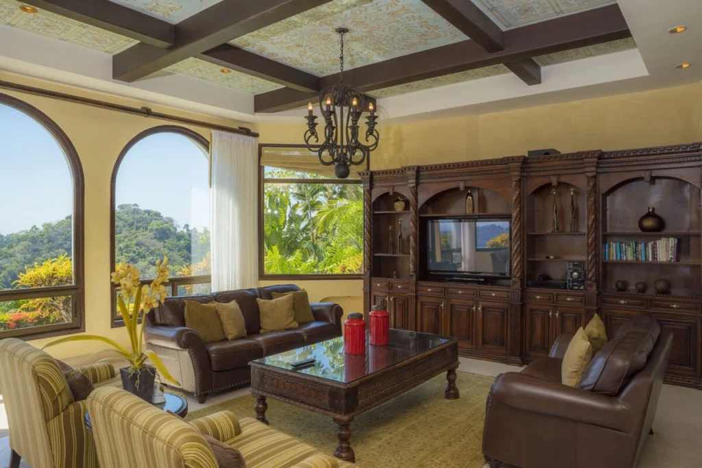 Rich wood finishes and upscale furnishings create refined spaces for entertaining or unwinding.