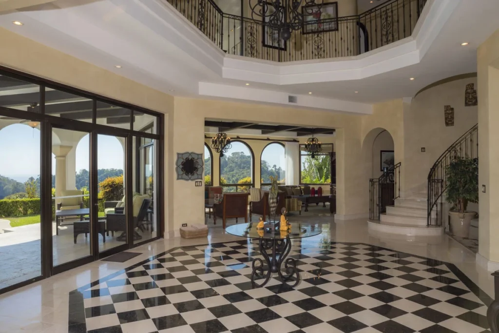 The grand entrance makes a bold statement and sets the luxurious tone of this stunning home.