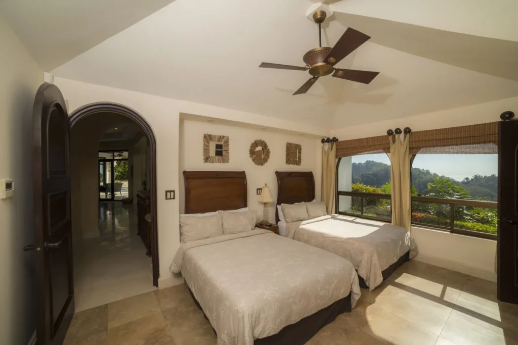 Large windows in this room flood the space with natural light and captivating views.