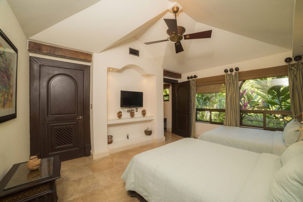 Two of the bedrooms feature dual full-size beds to accommodate more guests comfortably.