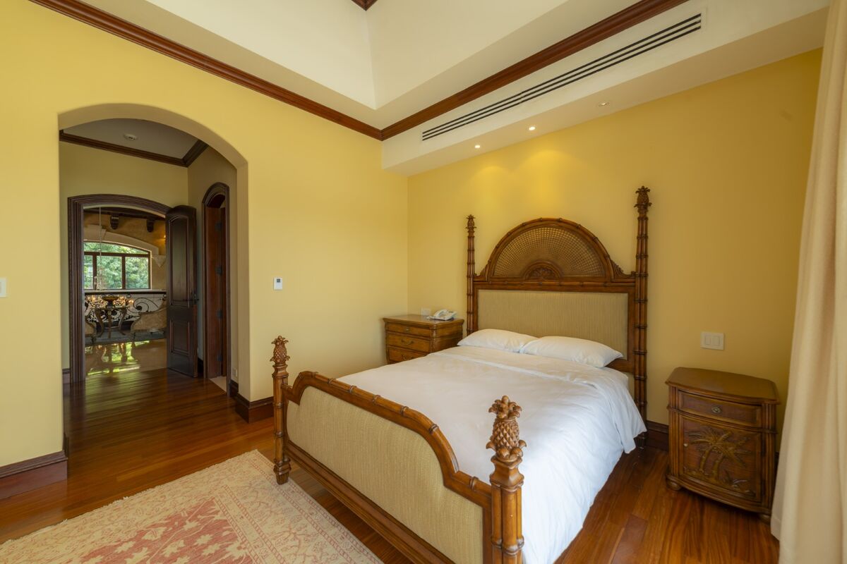 luxury villa bedroom los suenos ensuite access hardwood floors costa rica