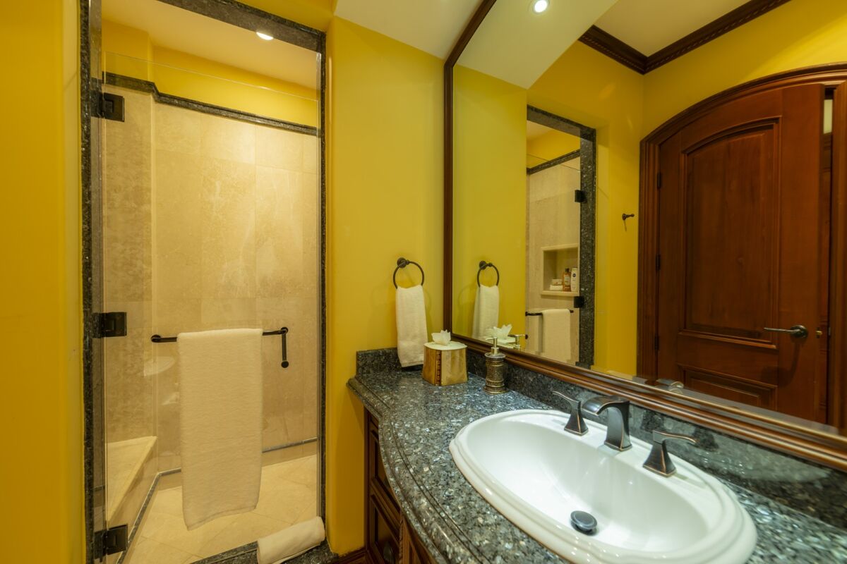 luxury villa bathroom los suenos granite vanity walk in shower costa rica