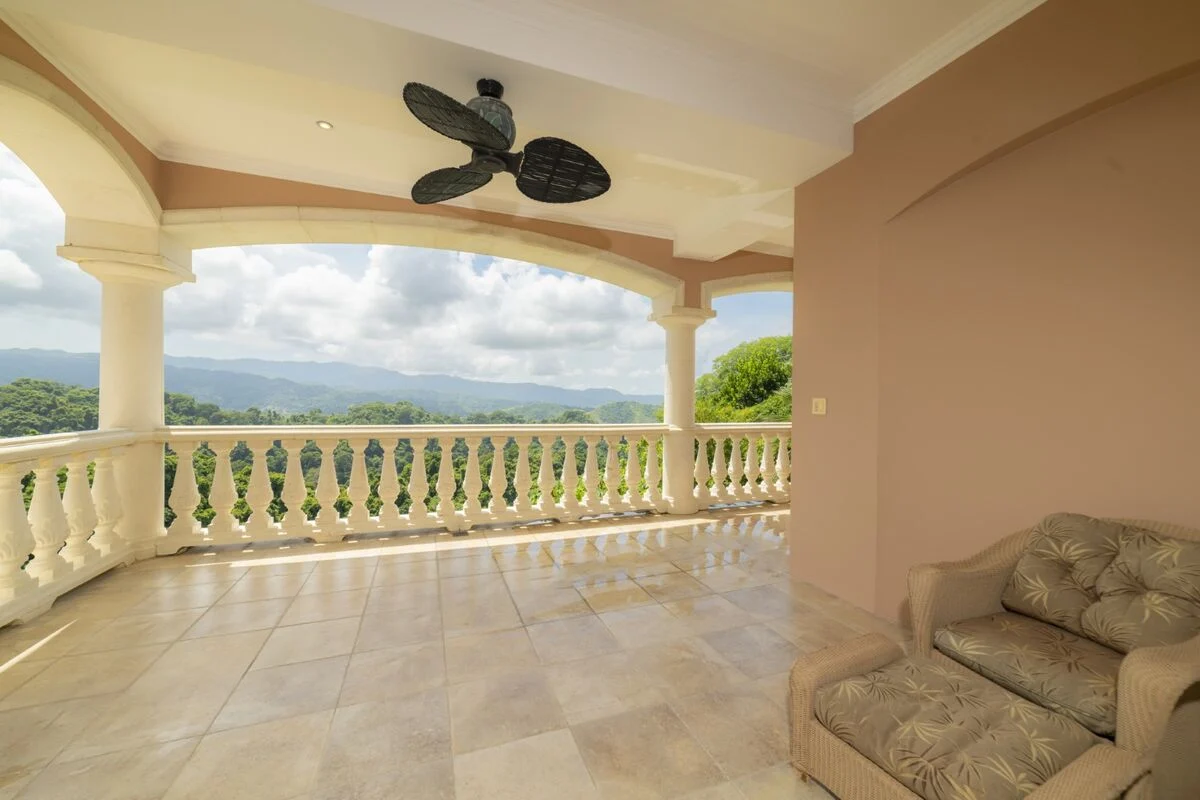 luxury villa covered terrace seating mountain view los suenos costa rica