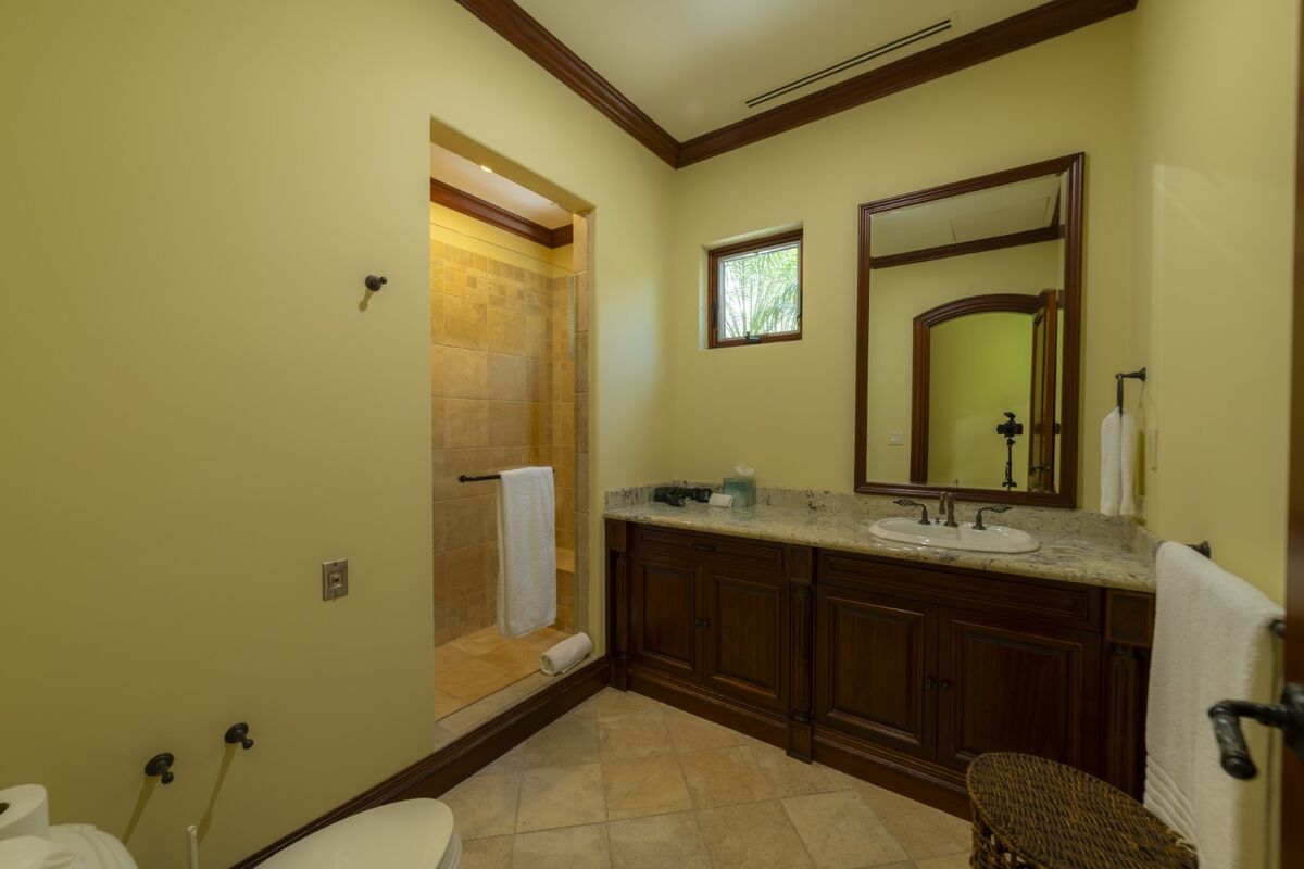 luxury villa bathroom walk in shower granite vanity los suenos costa rica