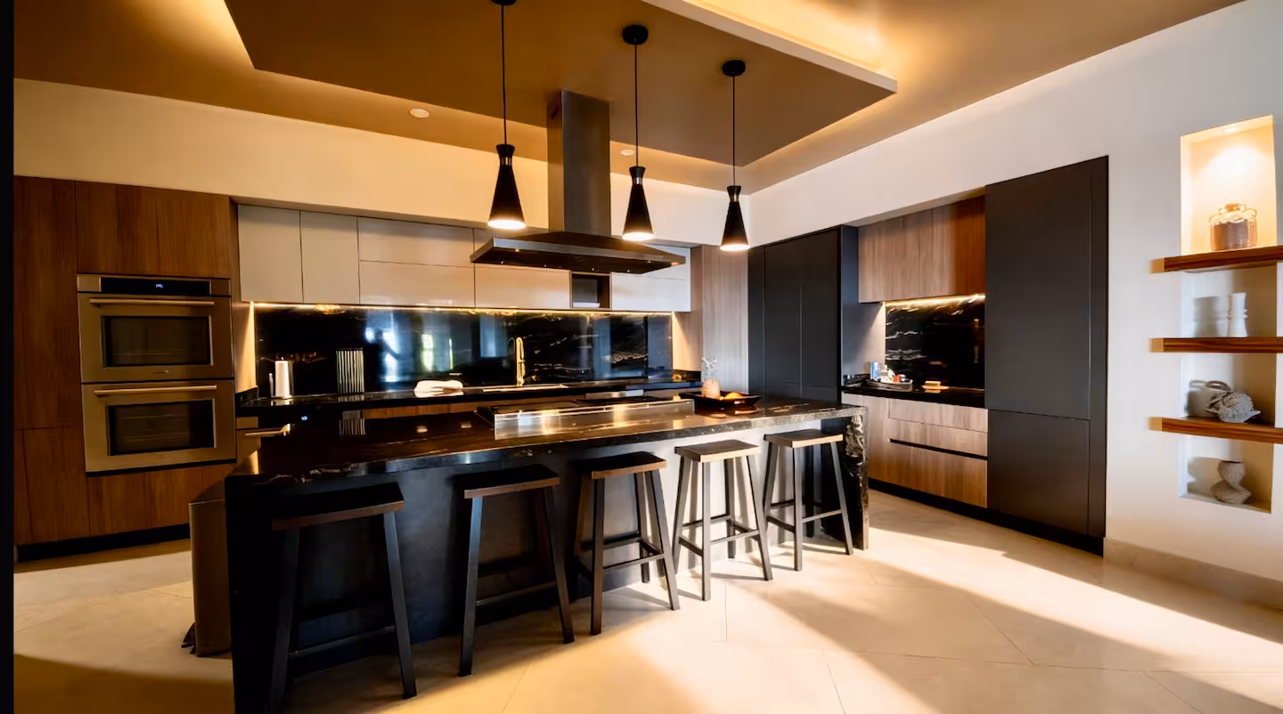 Modern gourmet kitchen with large island in a luxury Costa Rica vacation home