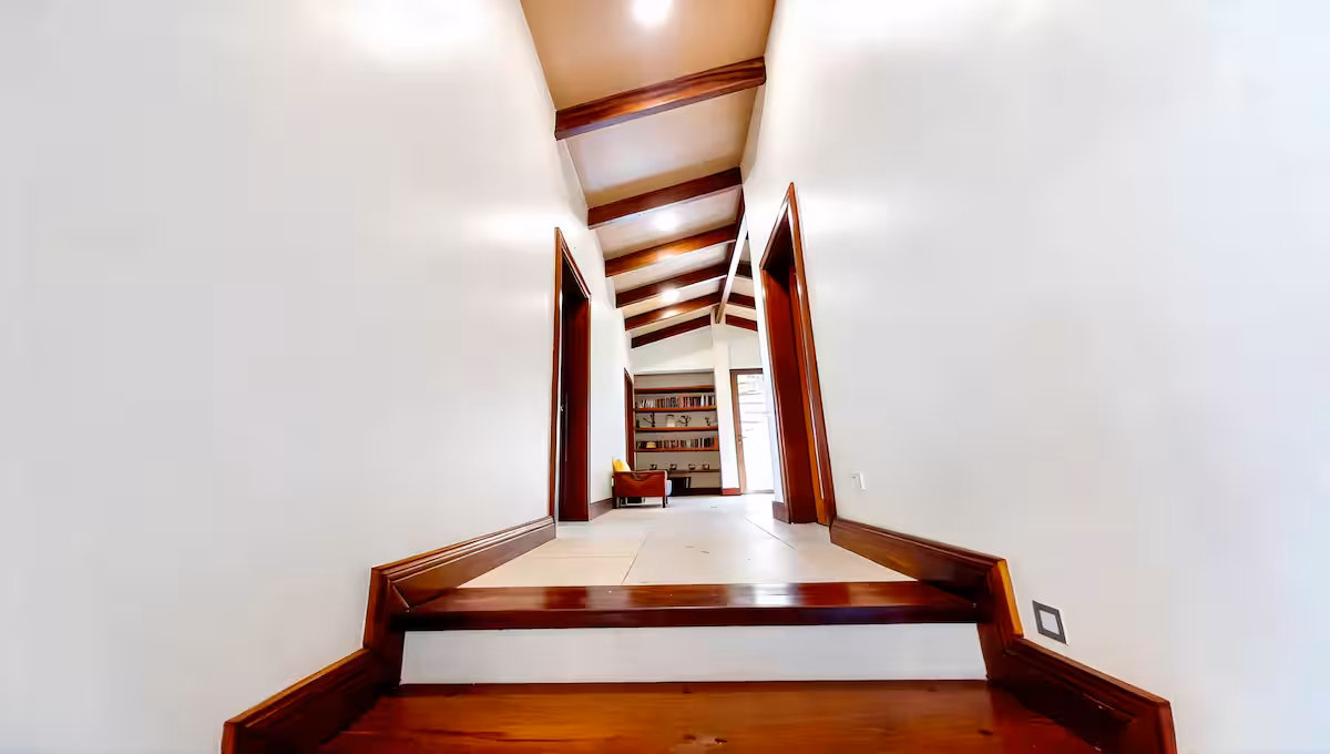 Vaulted hallway leading to the bedroom wing in a Costa Rica luxury beachfront villa