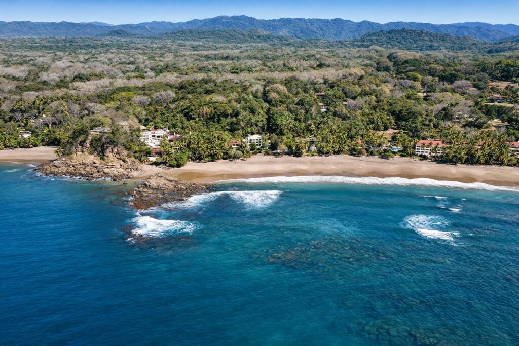 Aerial view of a secluded beachfront luxury villa location on Costa Rica's Pacific coast