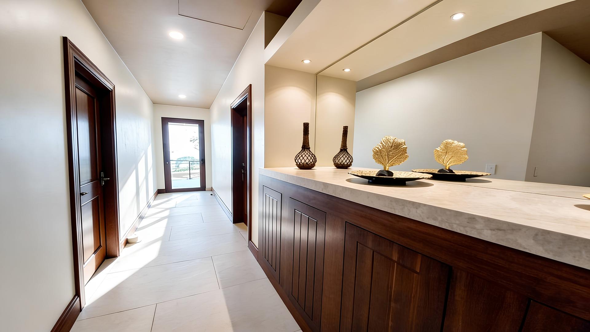 Interior hallway with double vanity and contemporary finishes in a Costa Rica luxury villa