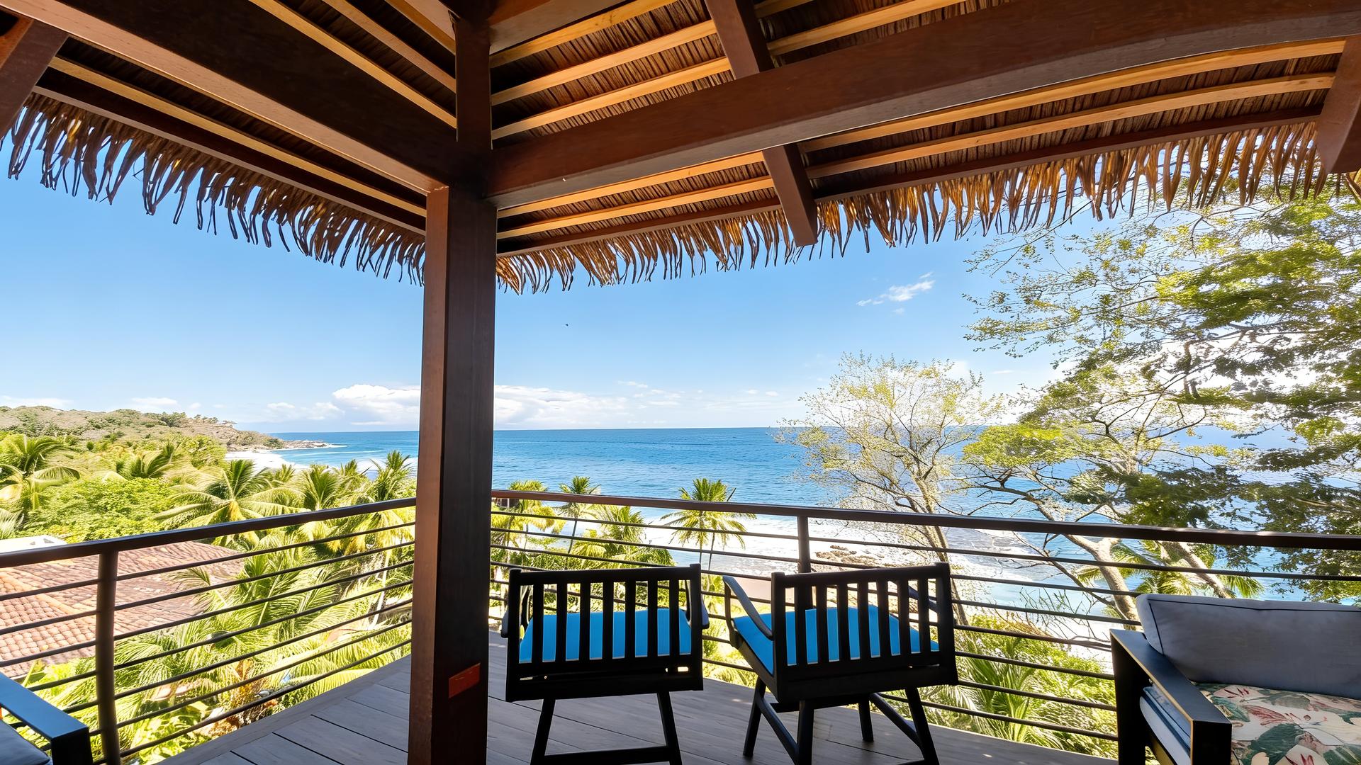Covered outdoor terrace with panoramic Pacific Ocean views at a luxury beachfront villa in Costa Rica